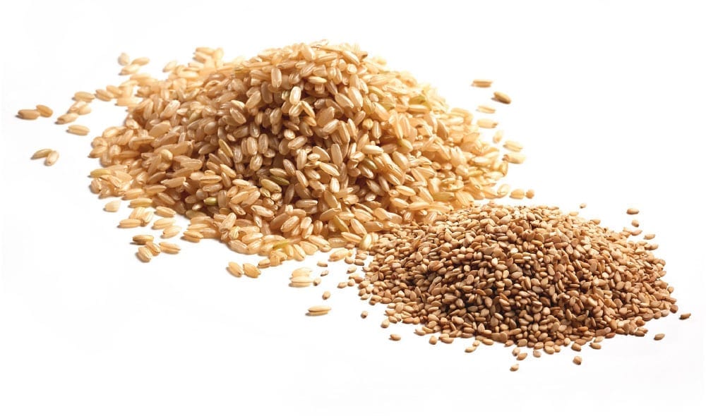 pile of medium grain rice and sesame seeds