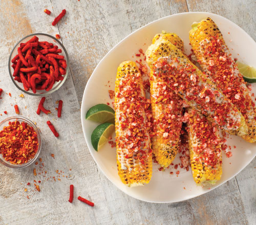 Crunchy Mexican Street Corn topped with chopped hot churrito sticks